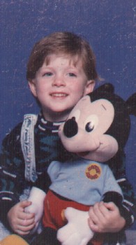 Michael with Mickey Mouse.